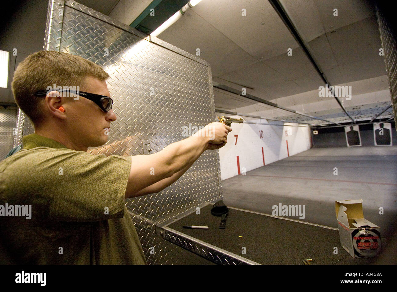 Male shooter at target practice Las Vegas Nevada Shooting gallery Stock Photo