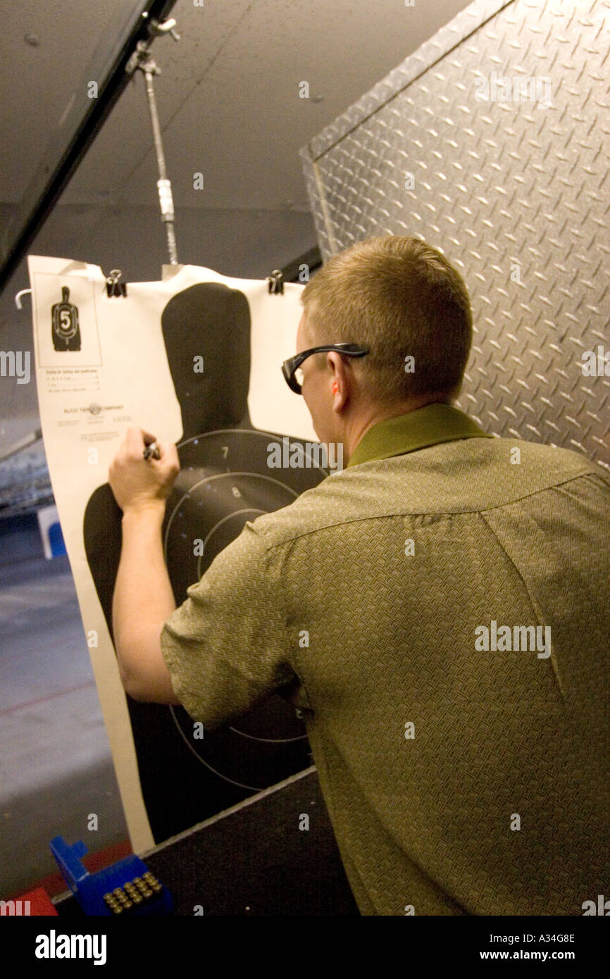 Male shooter at target practice Las Vegas Nevada Shooting gallery Stock Photo