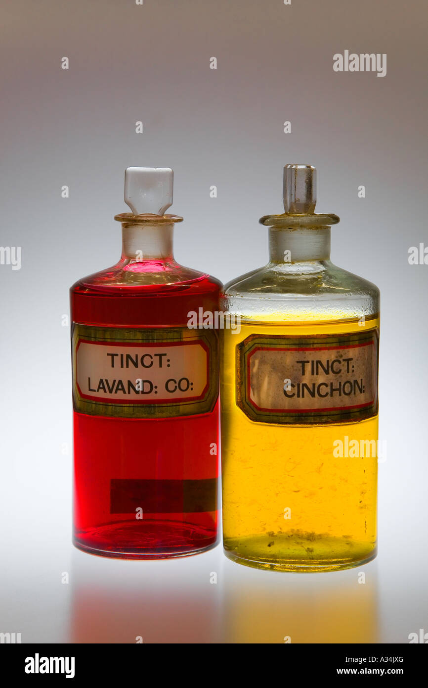 Coloured Liquid in Chemists glass stoppered Pharmacy Bottles