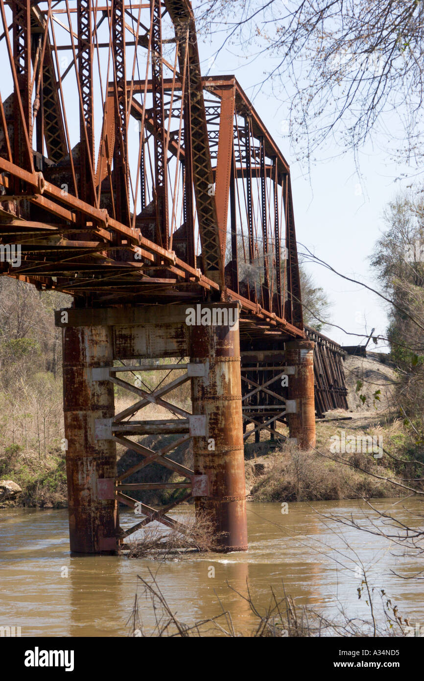 Old rusty steel railroad bridge over the Flint River in Albany