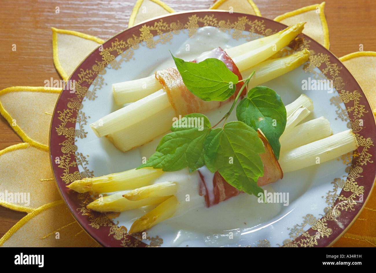Spargel mit Schinken, Asparagus Meal on Plate White Asparagus with Ham Stock Photo