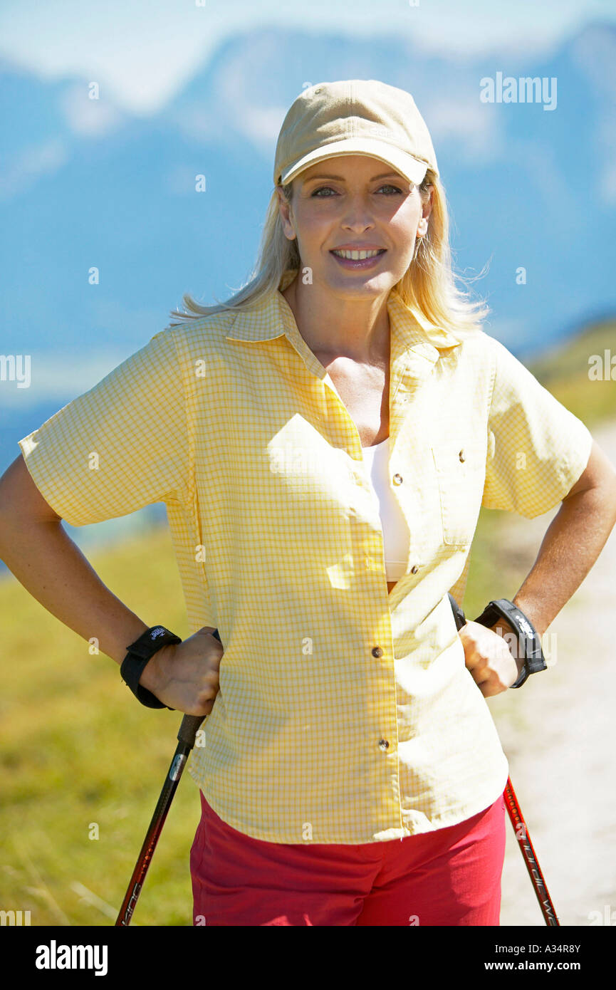 woman doing nordic walking, Frau beim Nordic Walking Stock Photo - Alamy