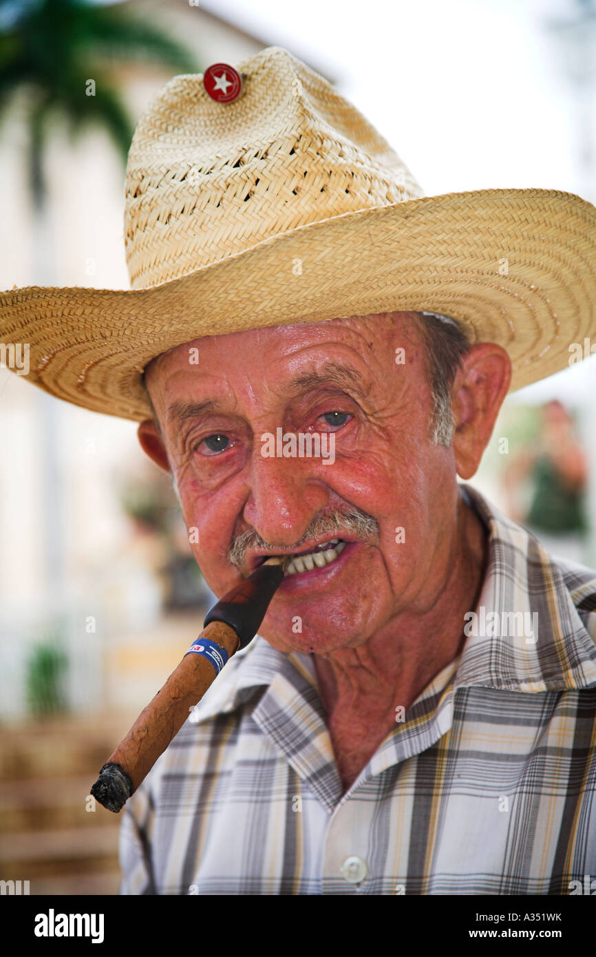 Old man smoking a cigar, Trinidad, Sancti Spiritus Province, Cuba Stock  Photo