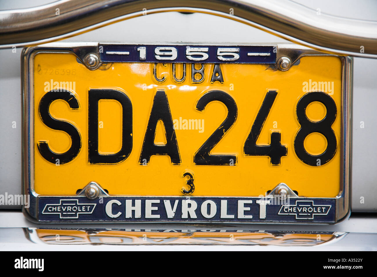 Licence plate, classic American 1955 Chevrolet car parked at the