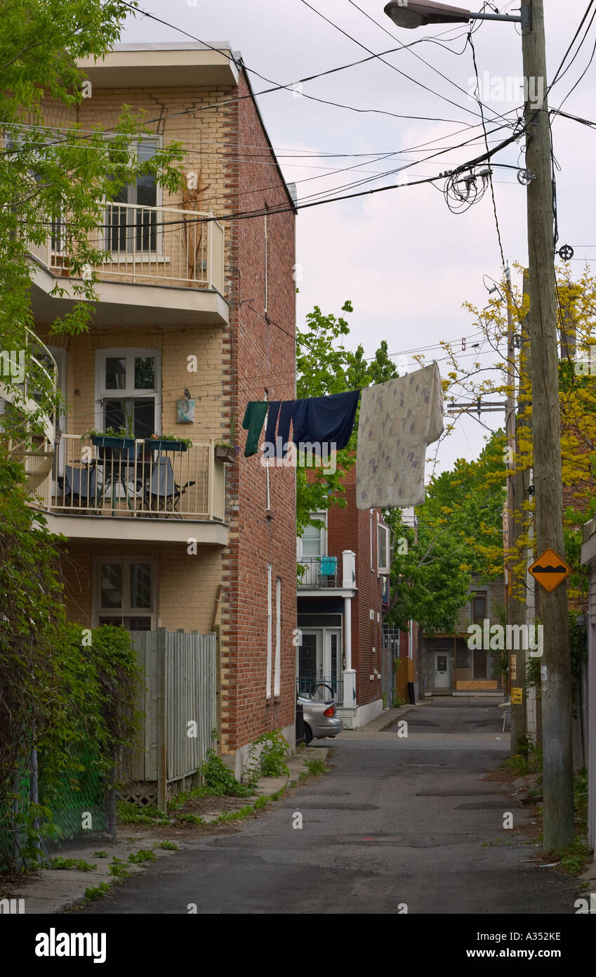 Back streets of Montreal, Quebec, Canada. Laundry drying on the line. Stock Photo