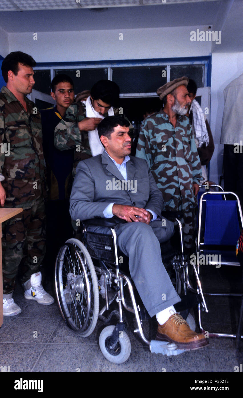 The President of Afghan Paralympic Federation Mr Abdul Rahman, toghetr with his military escort, takes part to the opening cerem Stock Photo