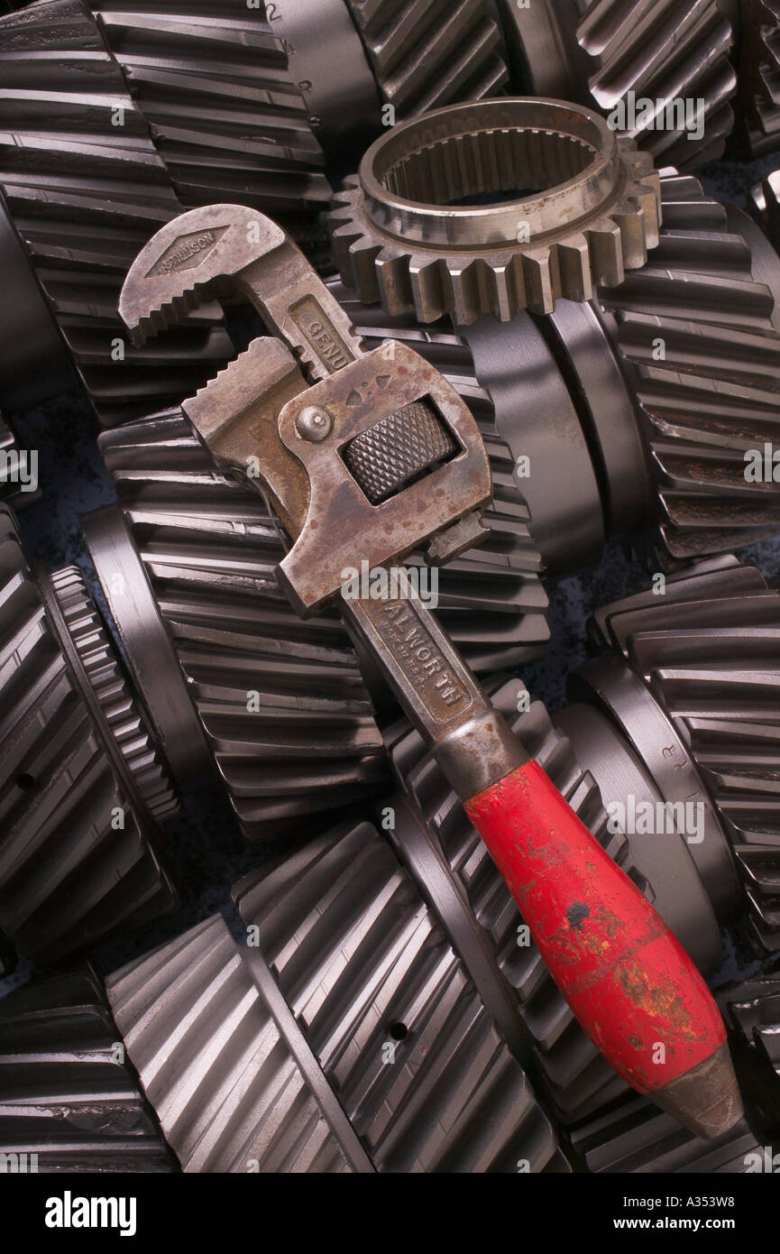 Monkey wrench on gears Stock Photo