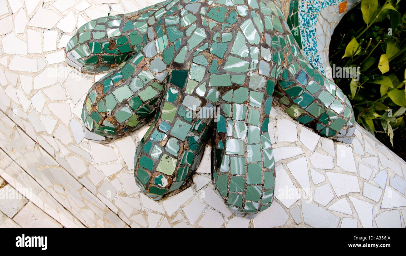 Detail of part of the famous mosaic chameleon spouting water at the Parc Guell Barcelona Spain Stock Photo