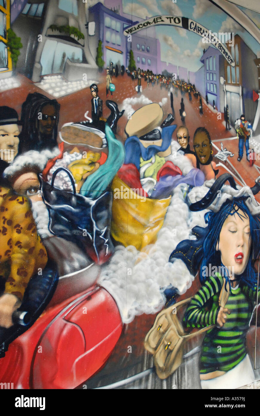 Colourful mural painting of young and trendy people in Carnaby Street London Stock Photo