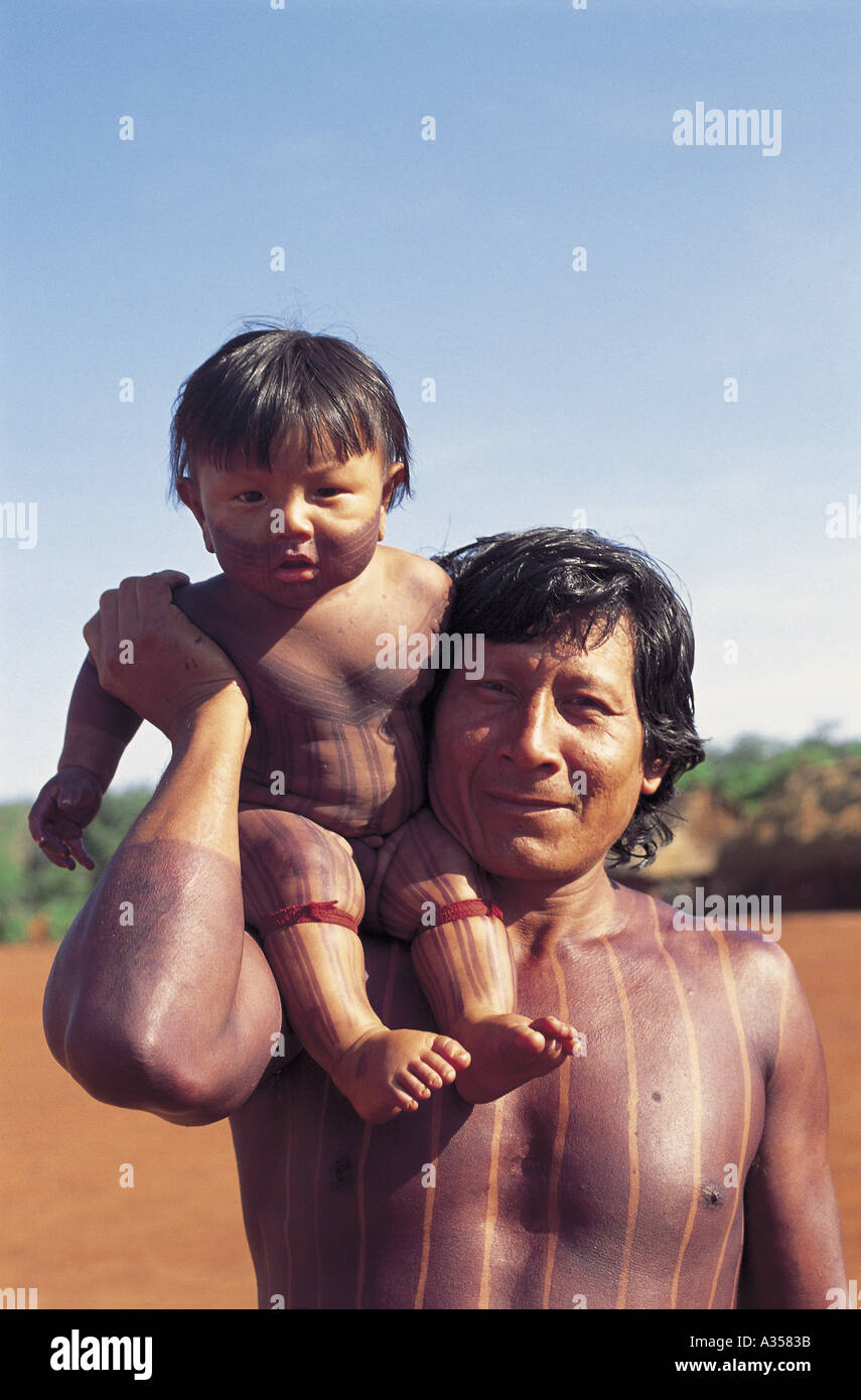 Kayapo man with his son Stock Photo
