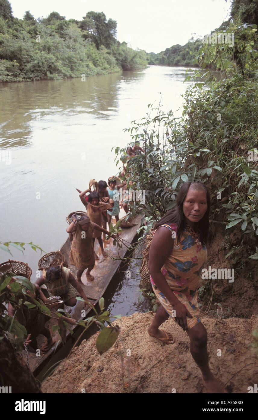 A Ukre village Brazil Kayapo women on a fruit collecting expedition with dugout canoe Xingu Indigenous Reserve Stock Photo