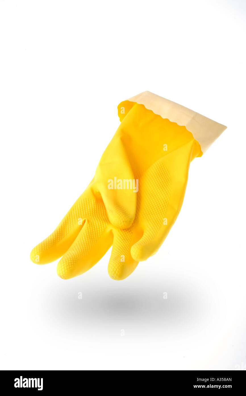 Yellow rubber dishwashing glove on white background with shadow Stock