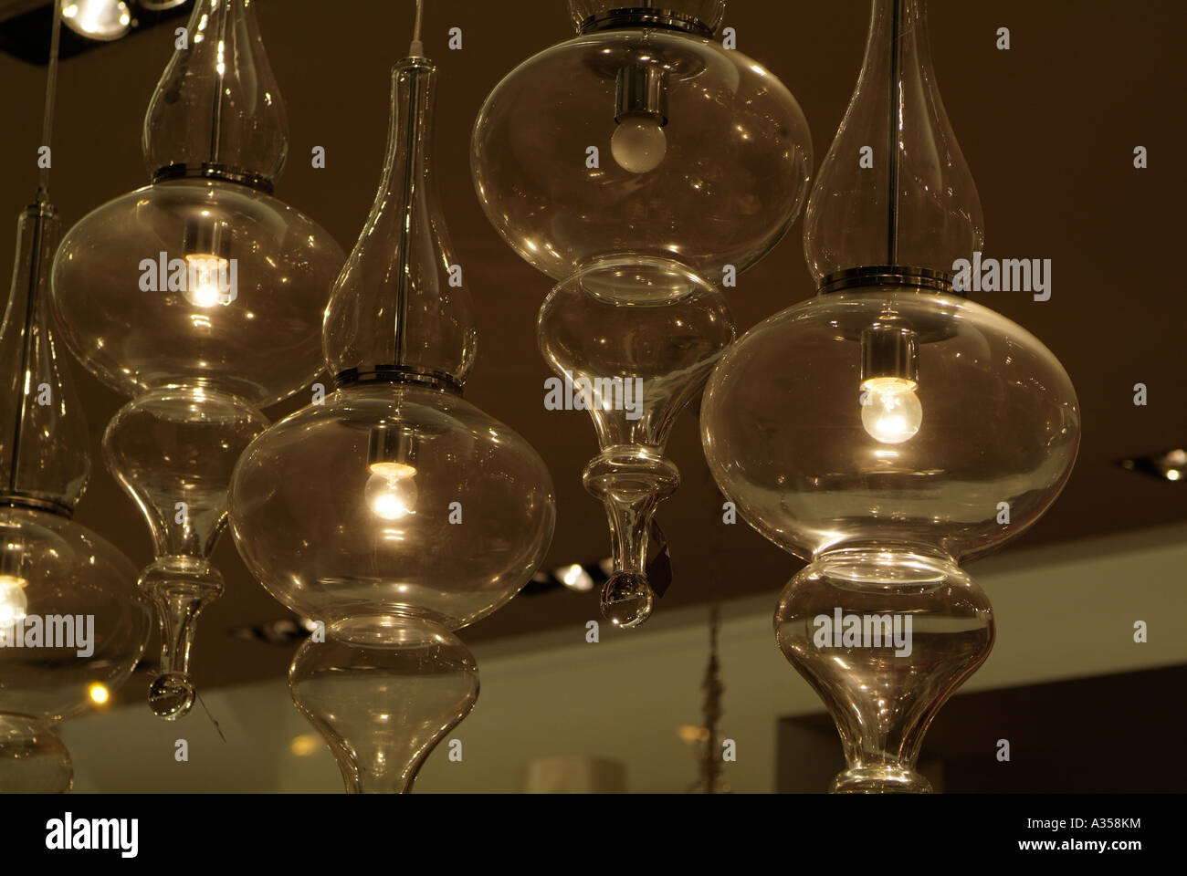 Glass lamps hanging from a ceiling Stock Photo Alamy