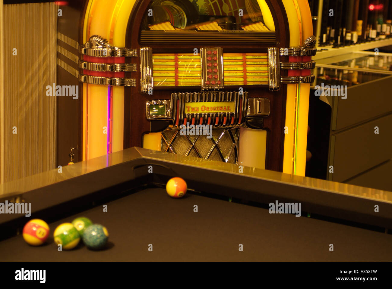 A jukebox and pool table in a rec room Stock Photo Alamy
