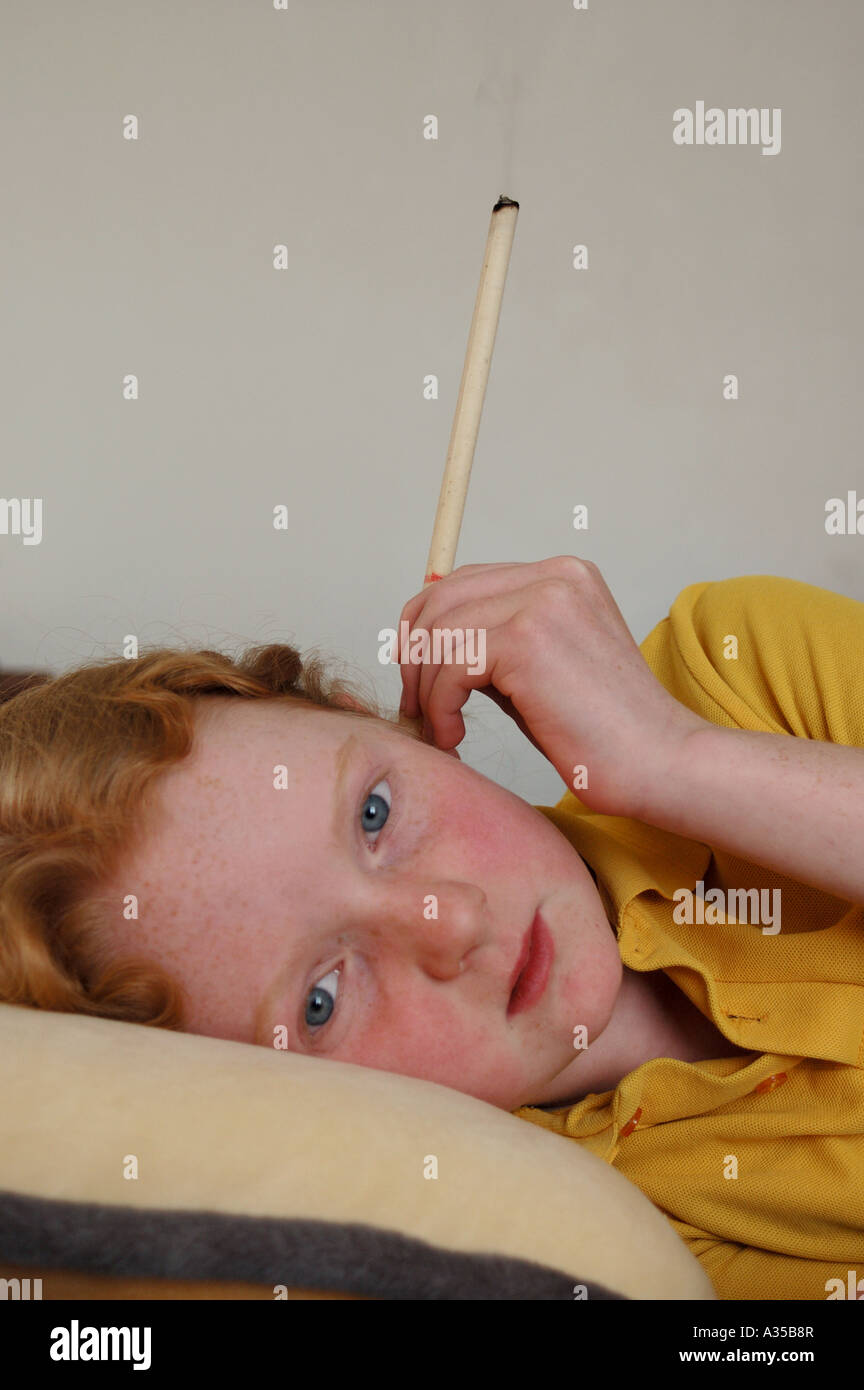 Hopi ear candle therapy Stock Photo Alamy