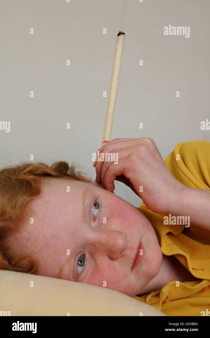 Hopi ear candle therapy Stock Photo Alamy