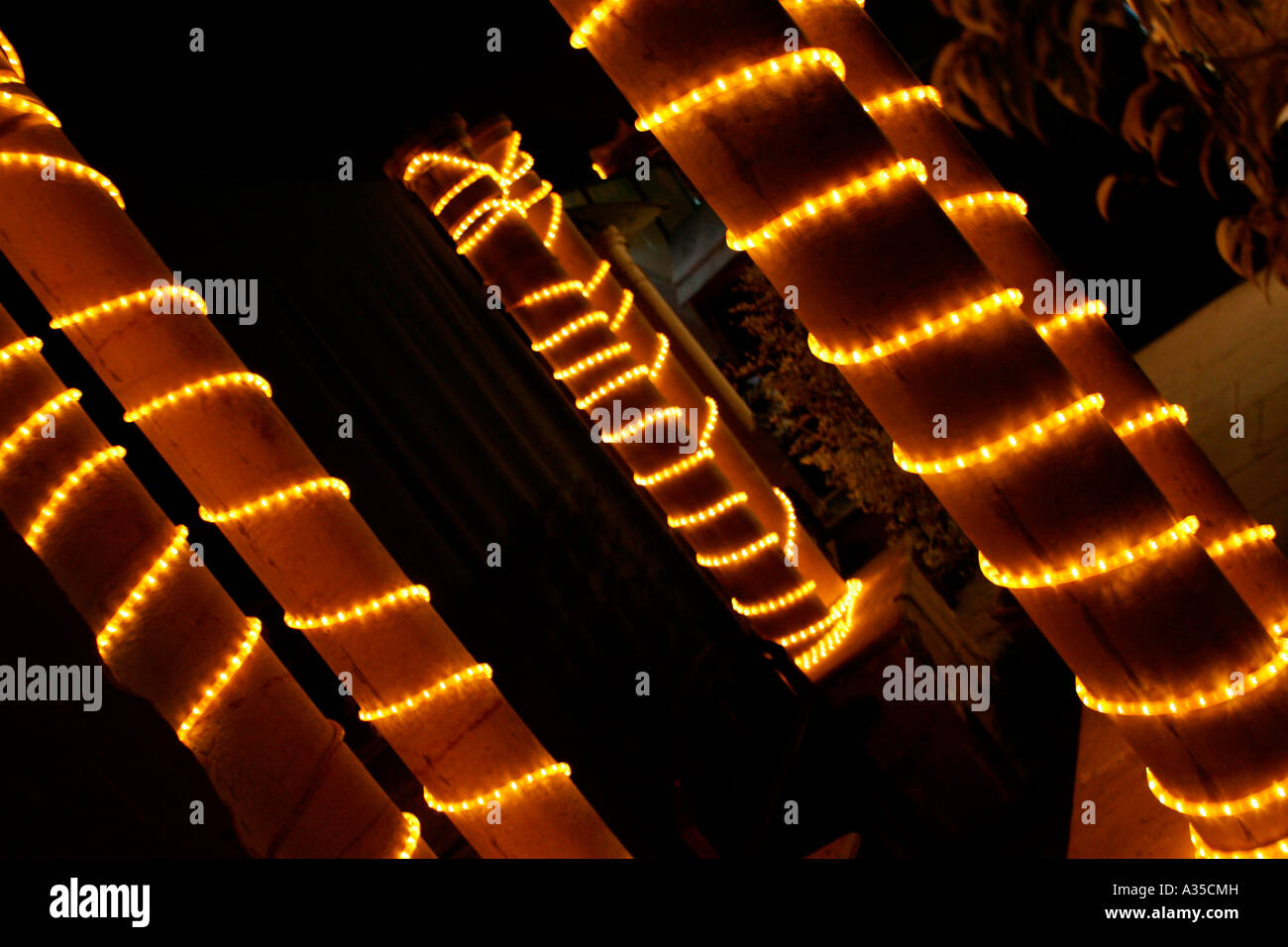 Illuminated pillars at a bazaar, New Delhi Stock Photo