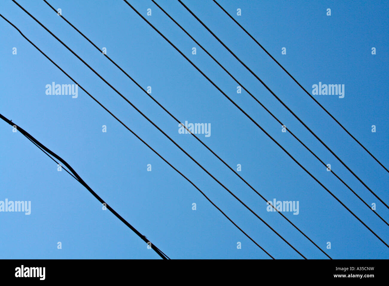 Electric cables overhead Stock Photo