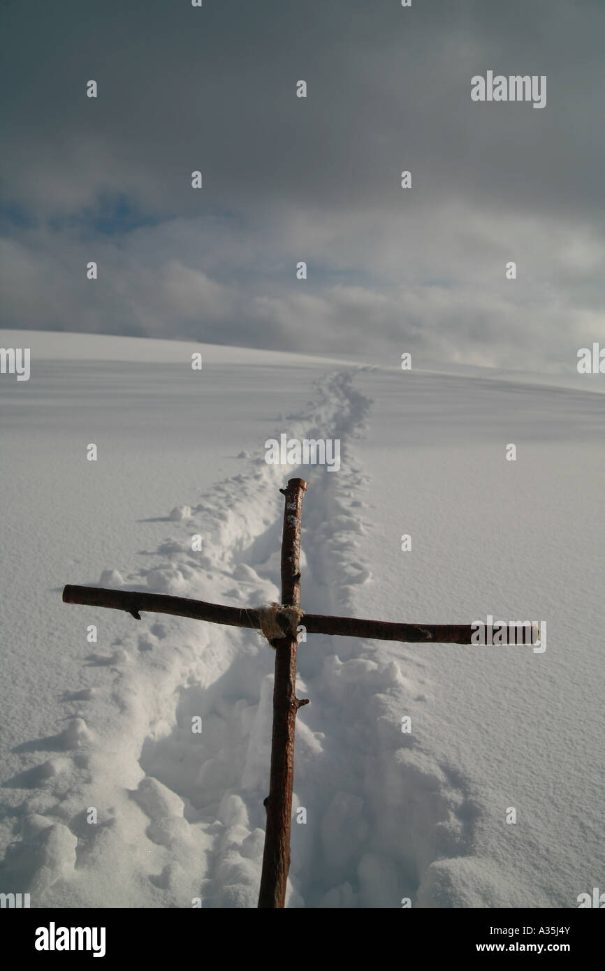 Cross in winterscene Stock Photo - Alamy