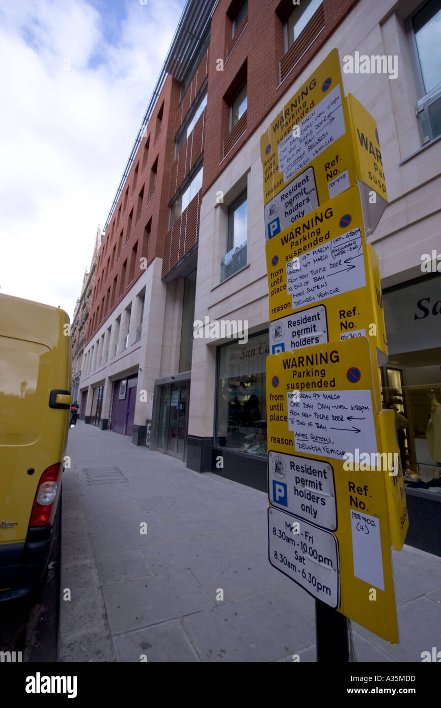 Warning parking suspended traffic signs Knightsbridge Stock Photo Alamy