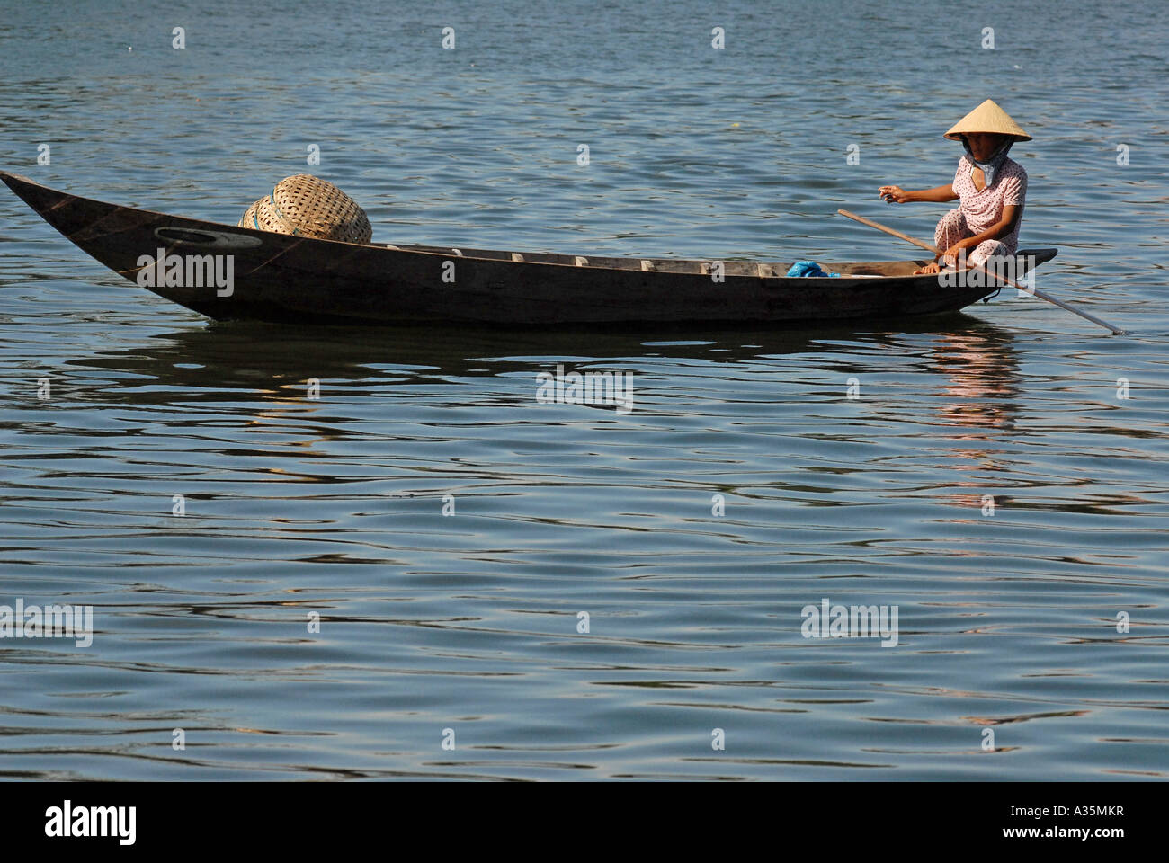 Woman on a boat Hoi An Vietnam Stock Photo - Alamy