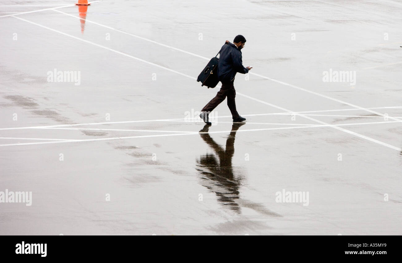 Man running to catch plane Stock Photo Alamy