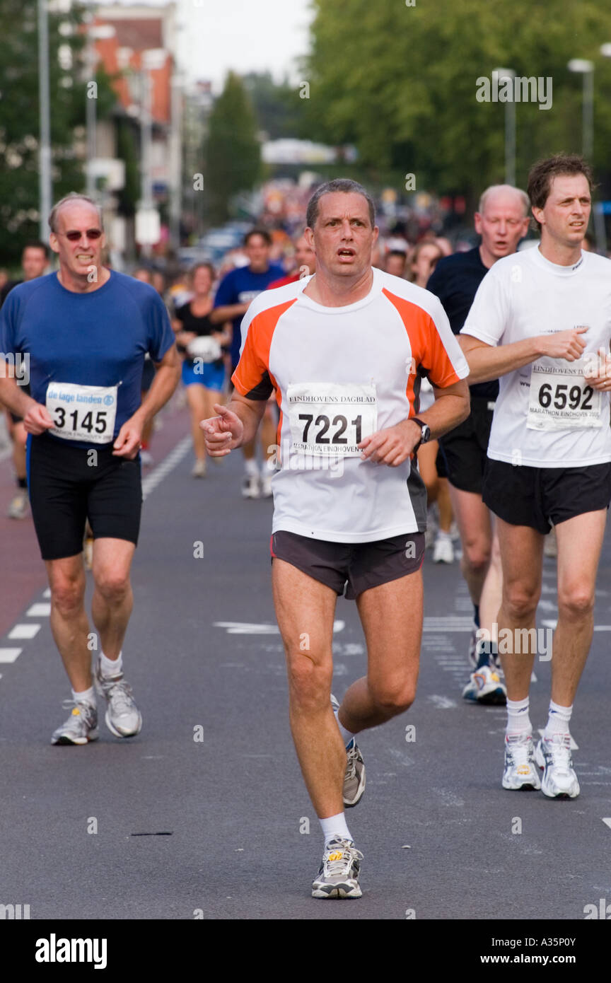 male Marathon runner leading the group Stock Photo - Alamy