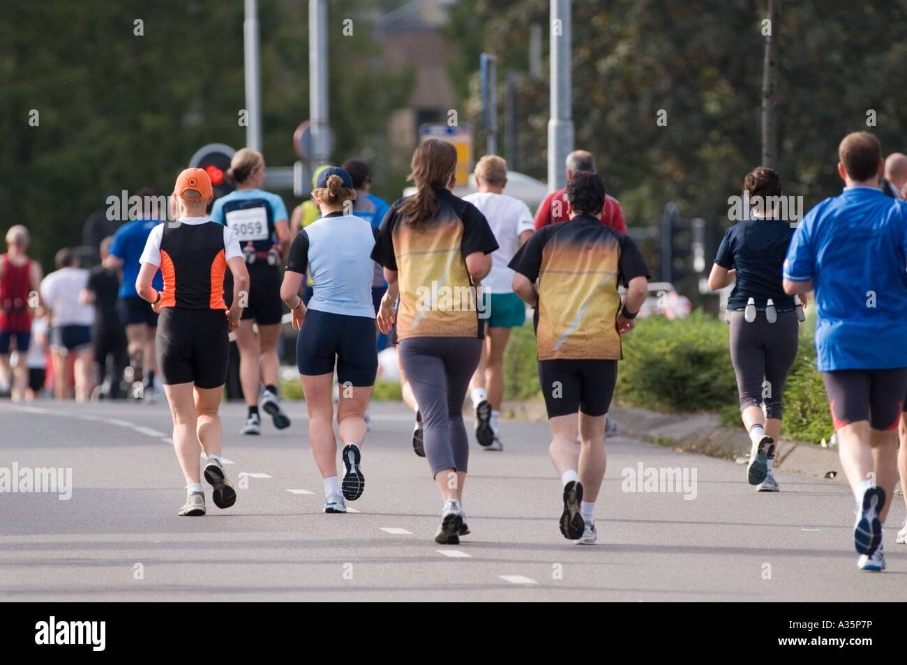 group of runners from behind Stock Photo Alamy