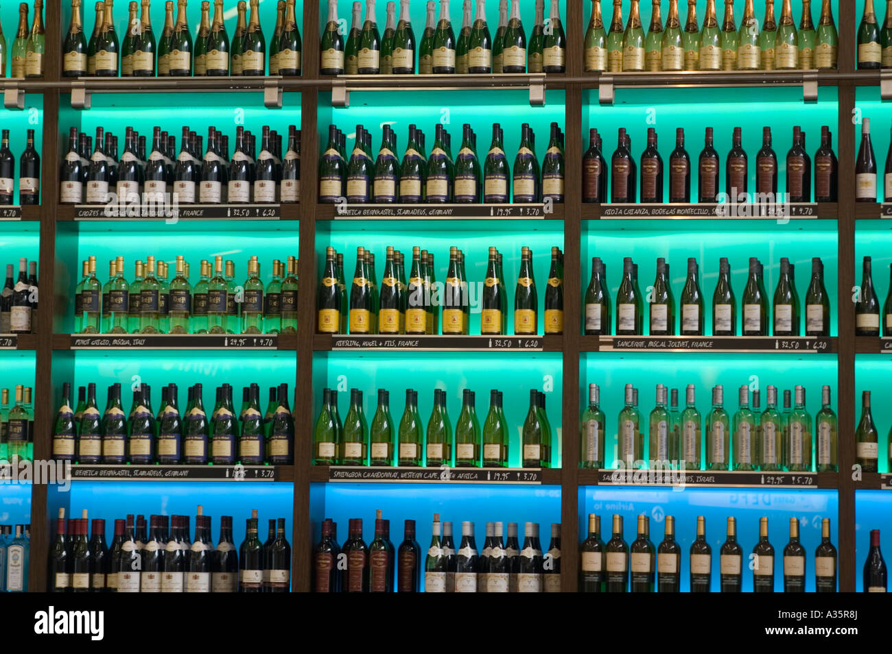 Bottles in a winerack Stock Photo Alamy