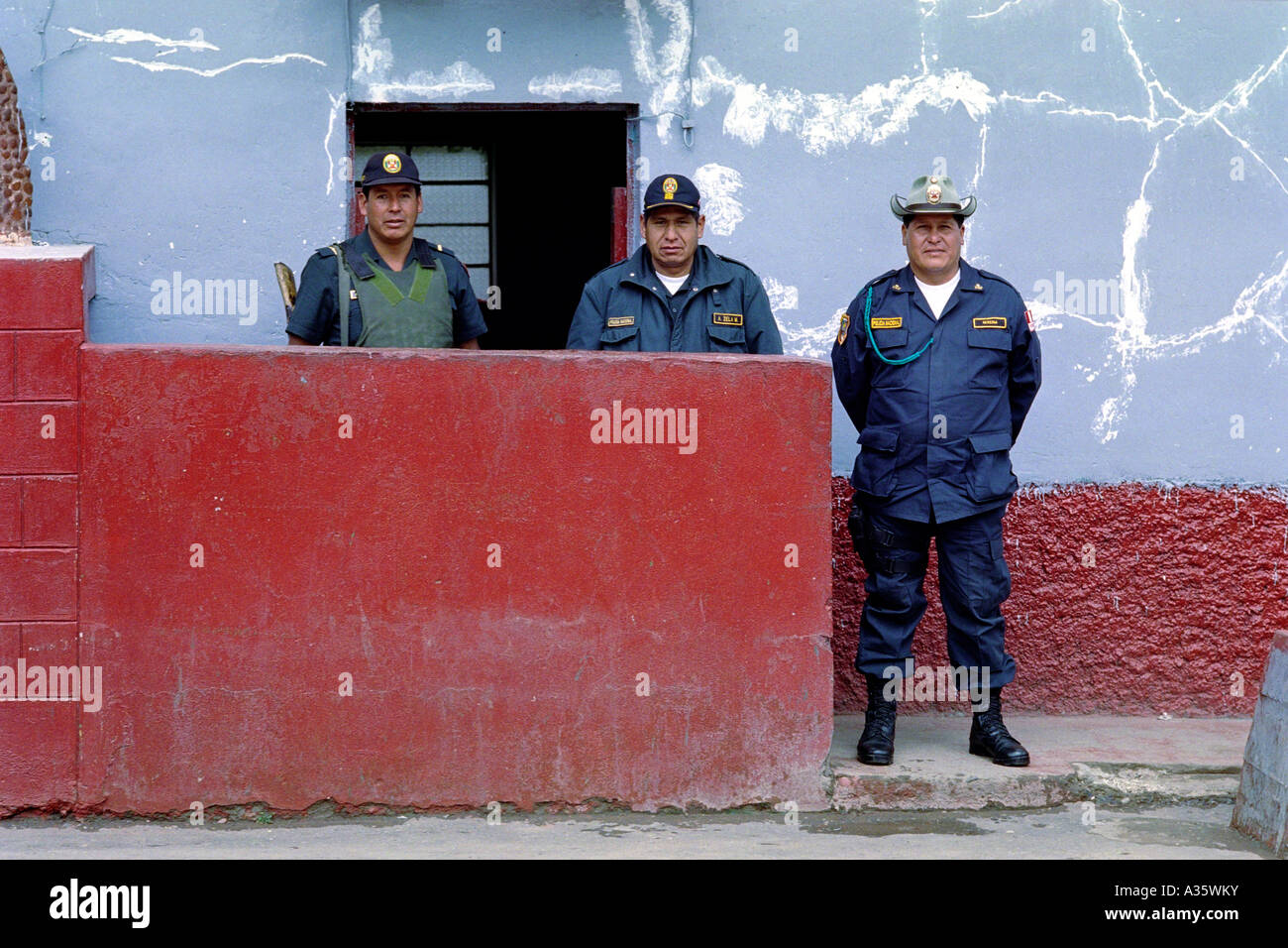 Police officers in front of their station in Pisac, Peru, South America Stock Photo