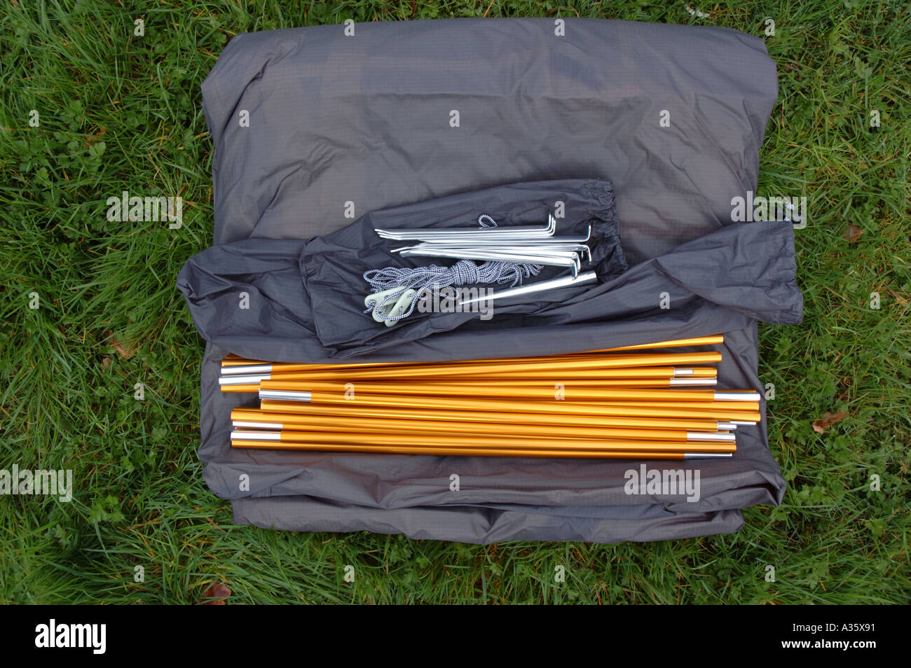 Lightweight tent components ready to pitch Stock Photo