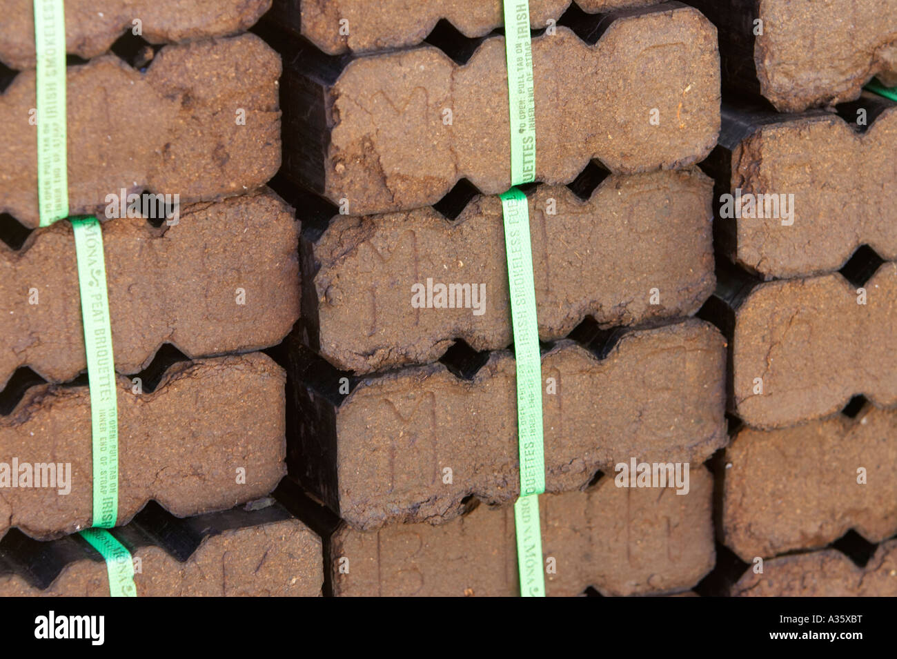 peat turf briquettes in a pile for sale in dublin Stock Photo Alamy