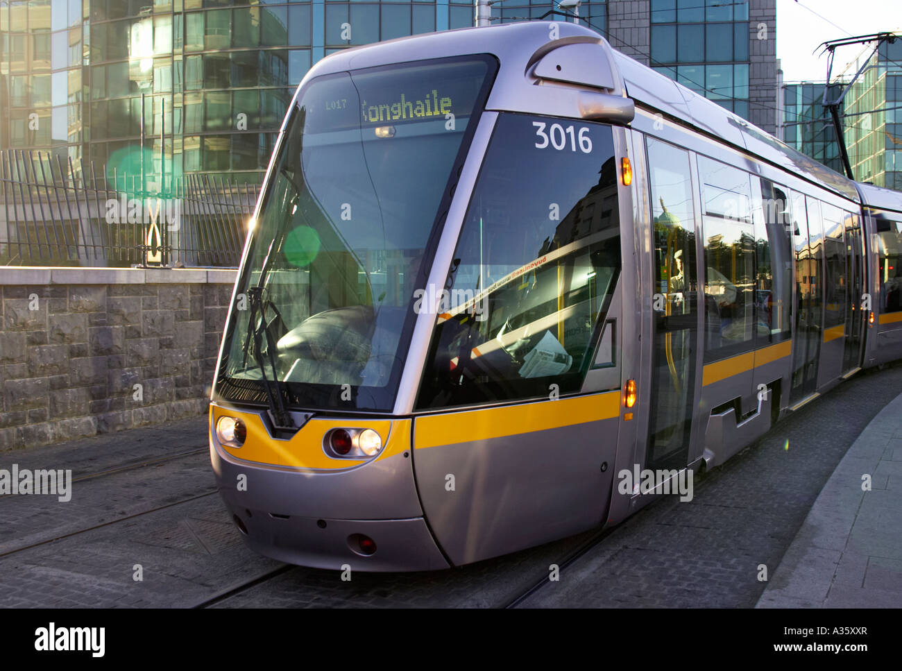 The LUAS dublins new tram system travelling into Connolly station from Tallaght on the red route connolly station Stock Photo