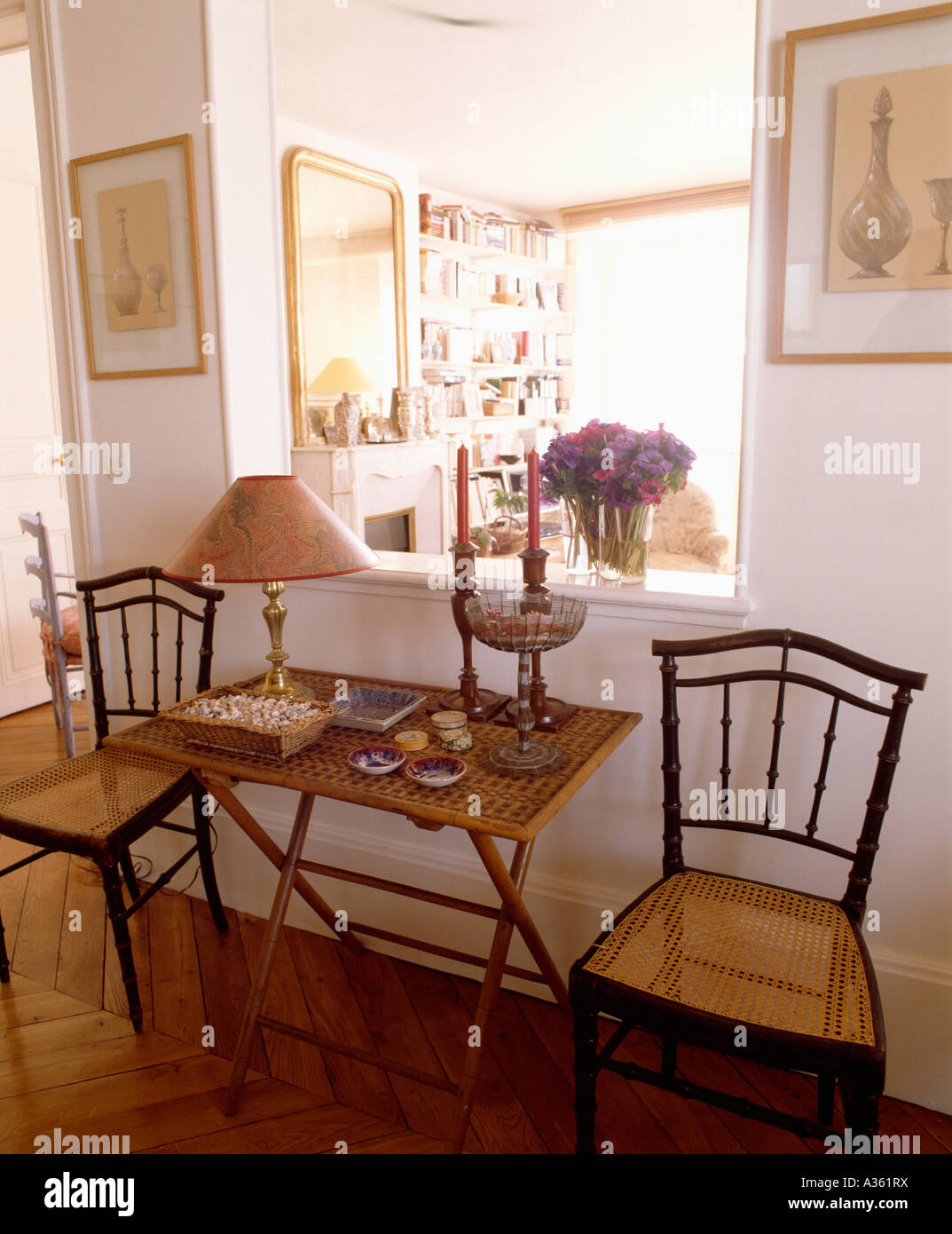 Antique Dining Chairs And Small Wooden Table In Front Of Half Wall In Stock Photo Alamy