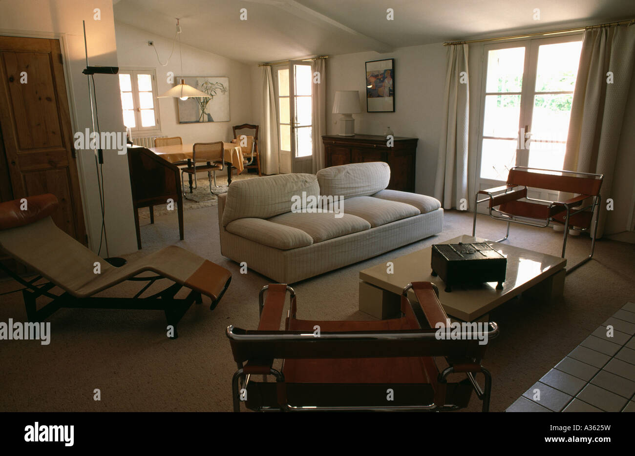 Modern Apartment Sitting And Diningroom With White Settee And Marcel Stock Photo Alamy