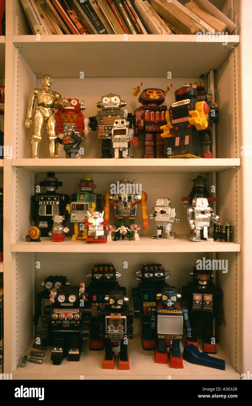 Close-up of shelves with collection of retro tin Star Wars figures and robots Stock Photo
