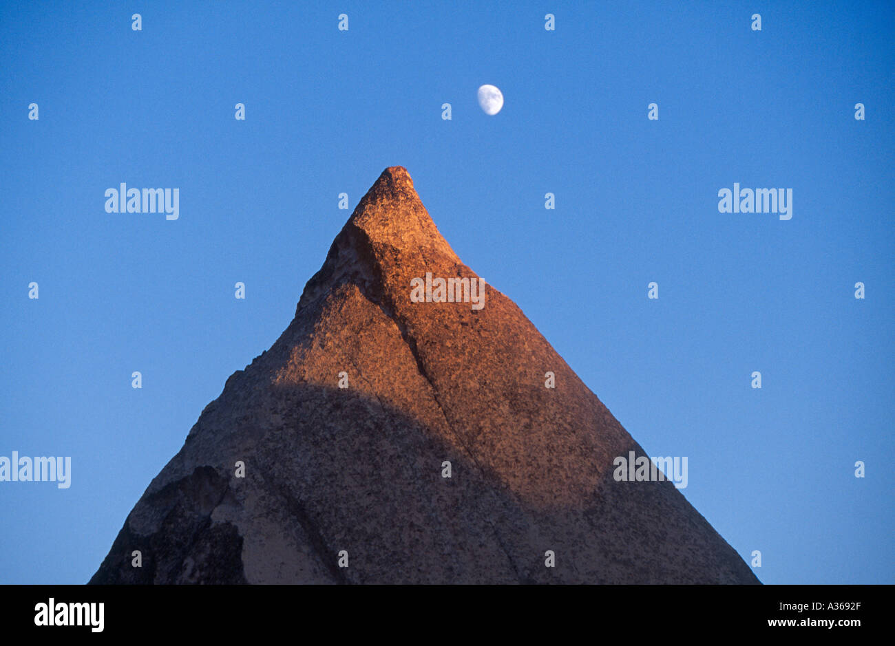 Moon and cone shaped rock formed by natural elements over the ages in ...