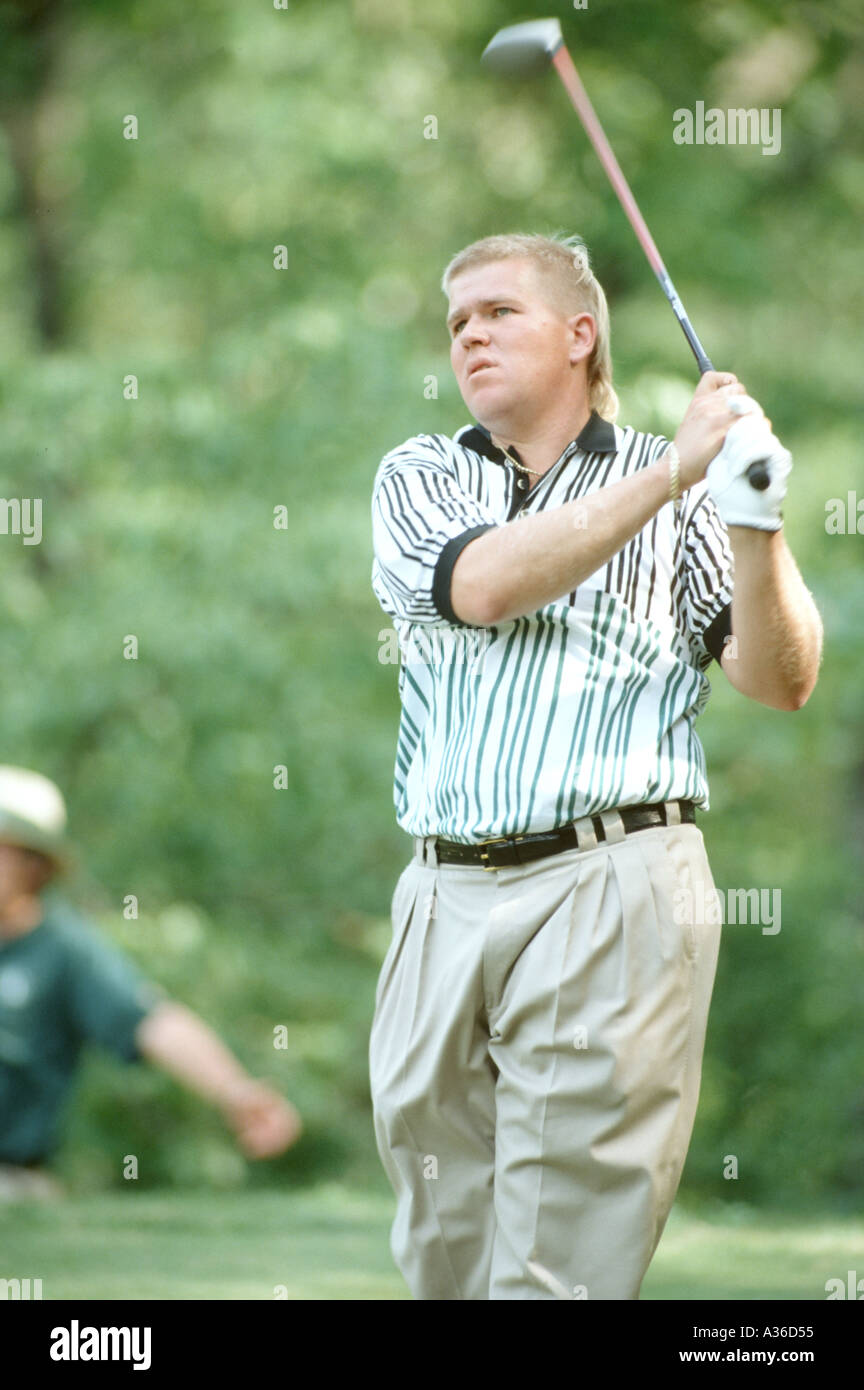John Daly a professional golfer swings his golf club at the Bell South