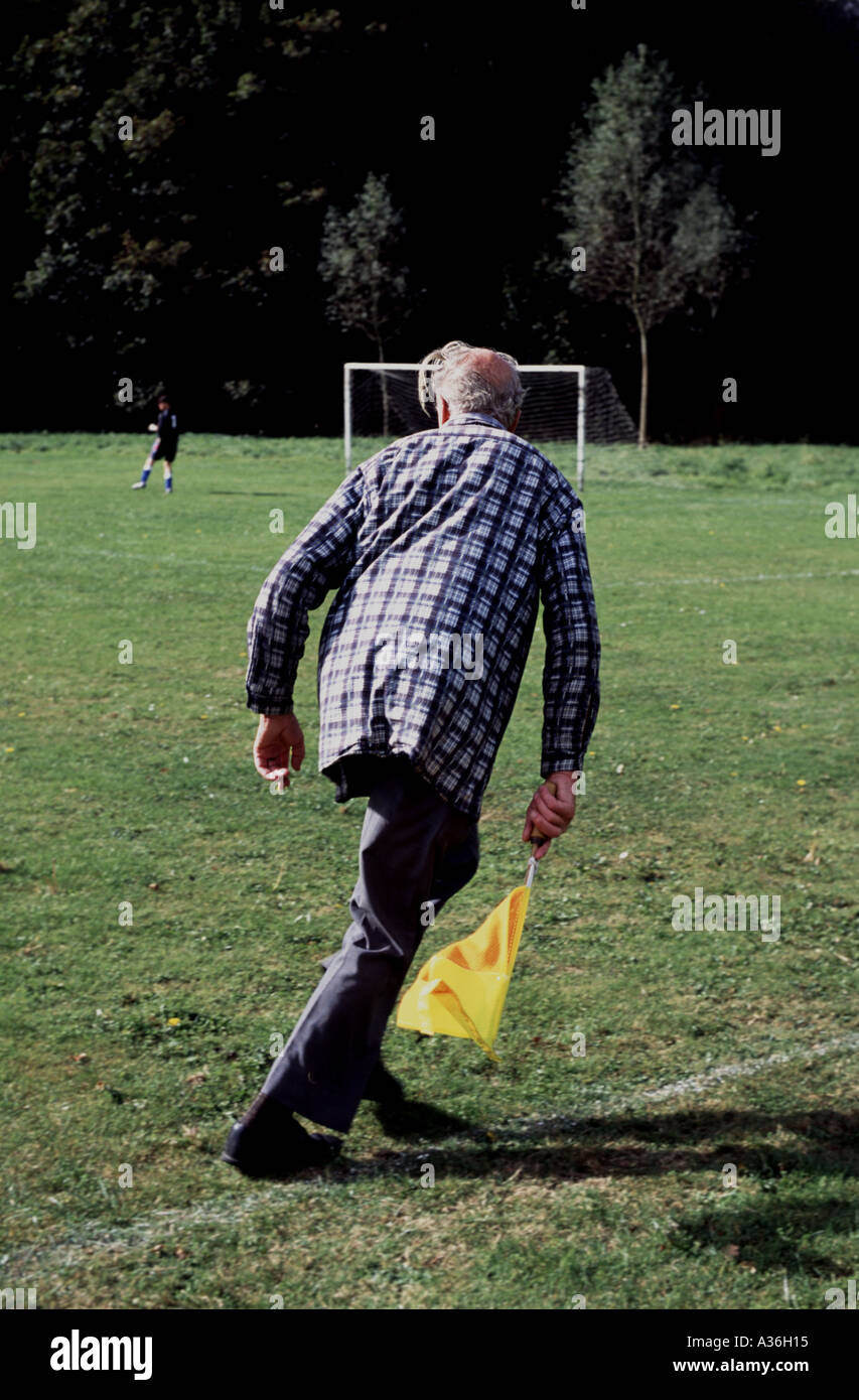 Amateur football linesman at a Sunday morning league game in Melton, Suffolk, UK. Stock Photo
