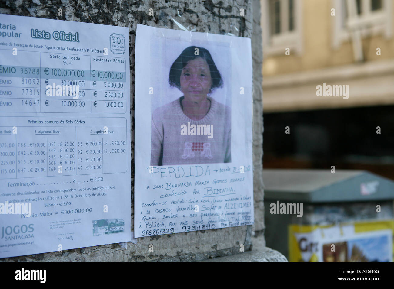 A poster of a missing person on a wall in a street in Lisbon, Portugal Stock Photo