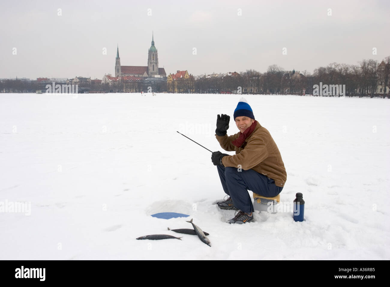 ice fishing on Theresienwiese (Oktoberfest Area) Munich Bavaria Germany Europe Stock Photo