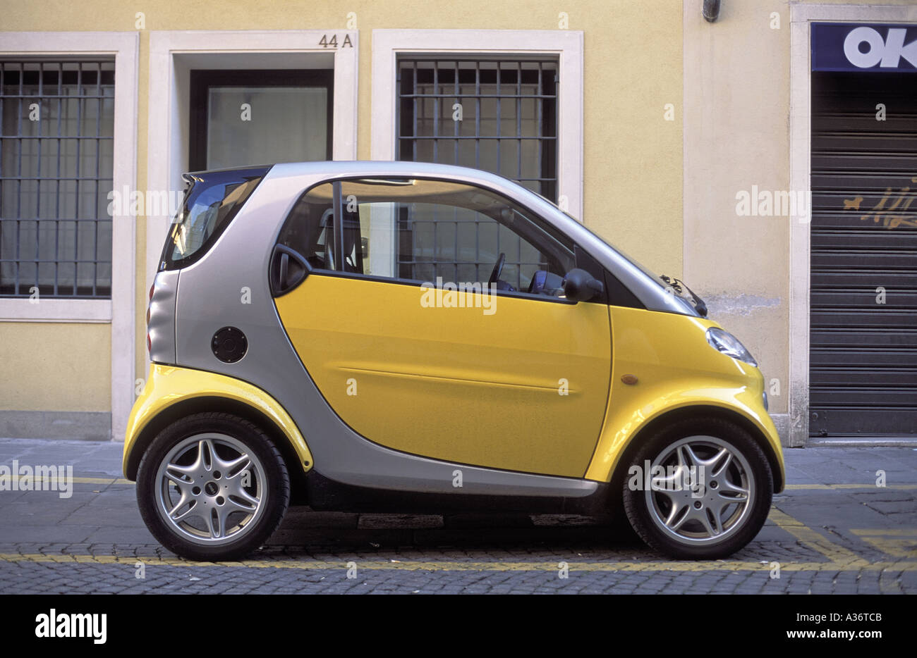 The tiny Smart car on an Italian street Stock Photo