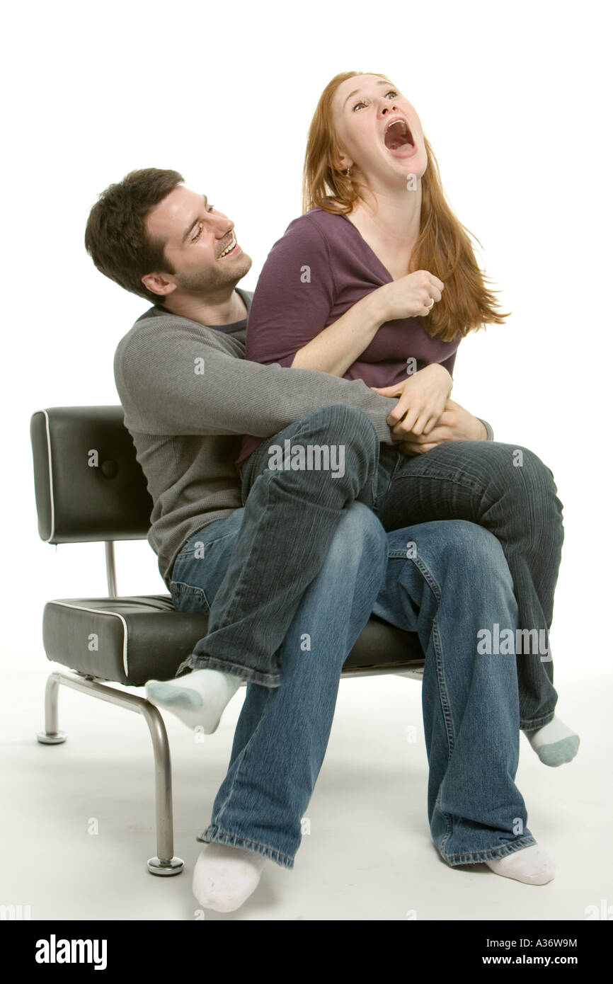 Girl Sitting On Boy Lap