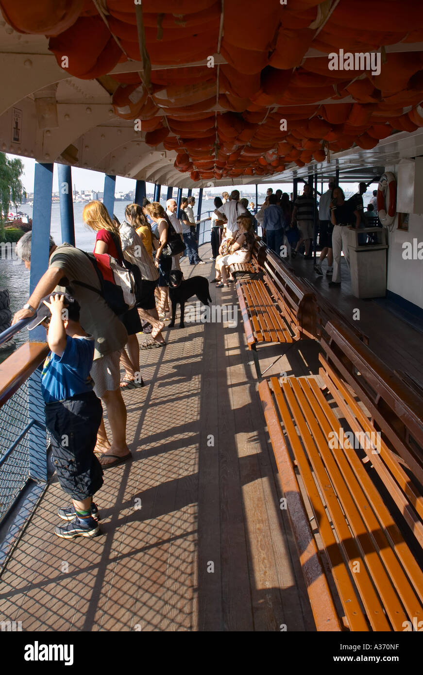 View of the interior and passengers of the Toronto Islands ferry. Stock Photo