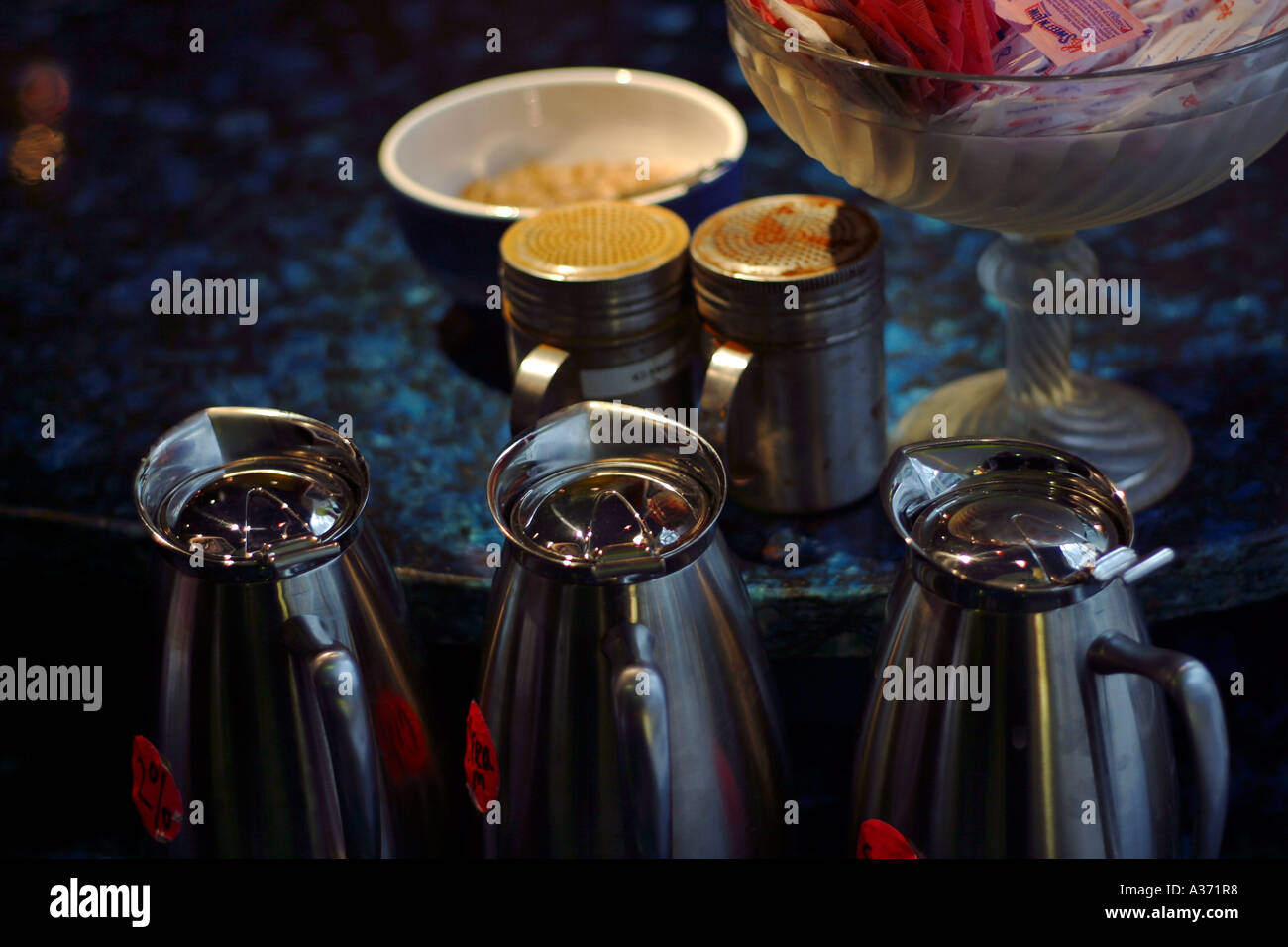 Moody intimate shot of spices and condiments at a restaurant. Stock Photo