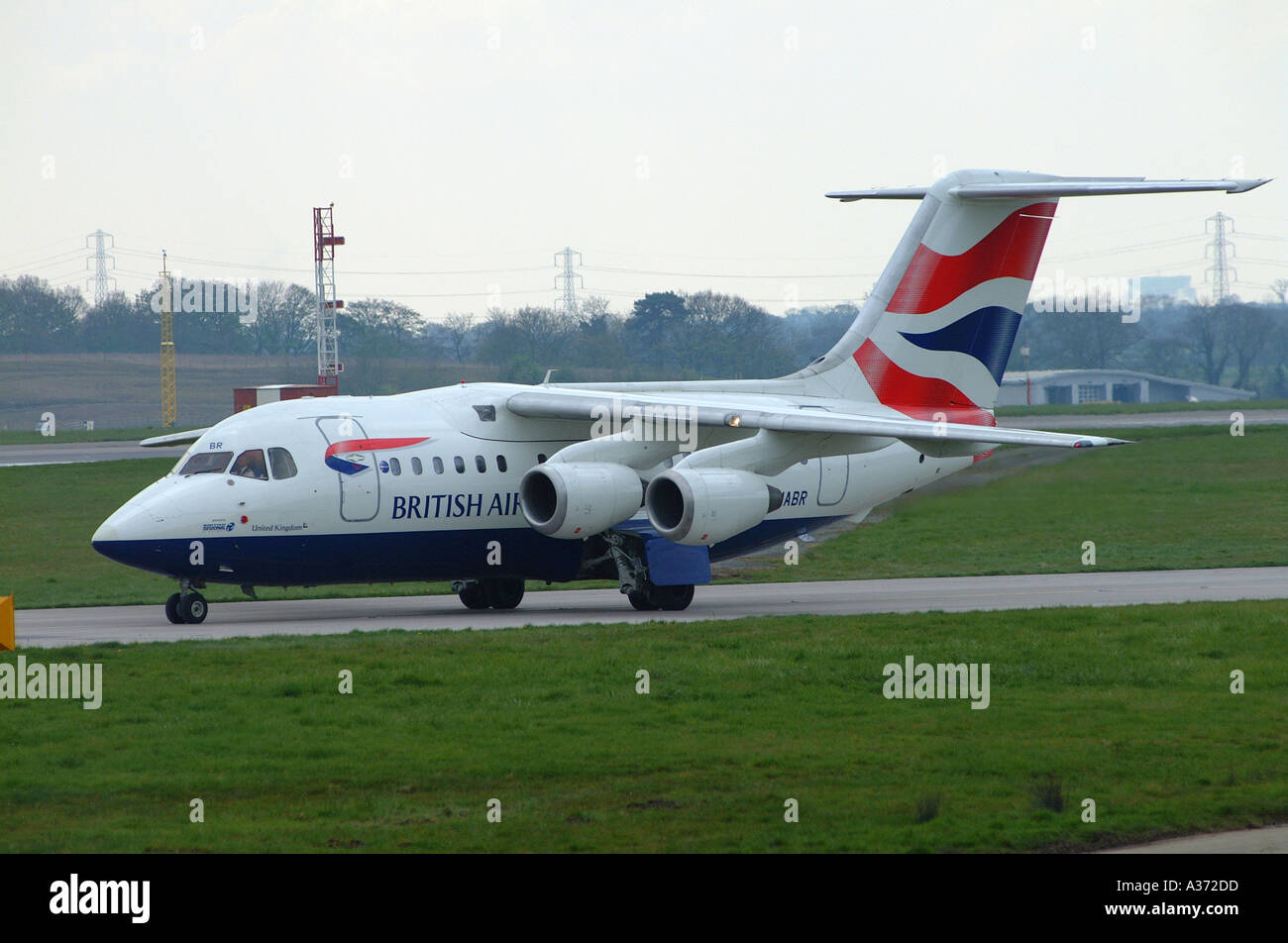 British Airways Regional BAe 146-100 Airliner G-MABR Taxiing at Manchester International Airport England United Kingdom UK Stock Photo