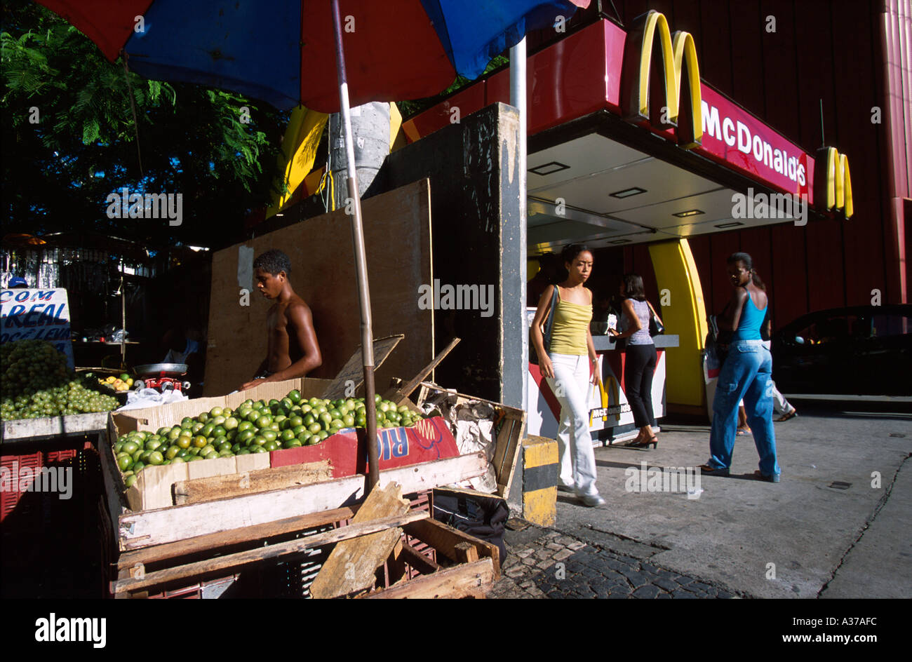 Traditional fruit stall and mcdonnalds Salvador de Bahia Stock Photo