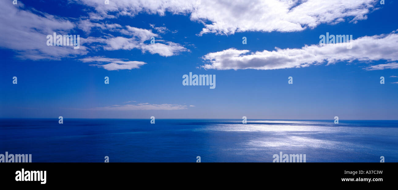 White clouds blue sky sea hi-res stock photography and images - Alamy