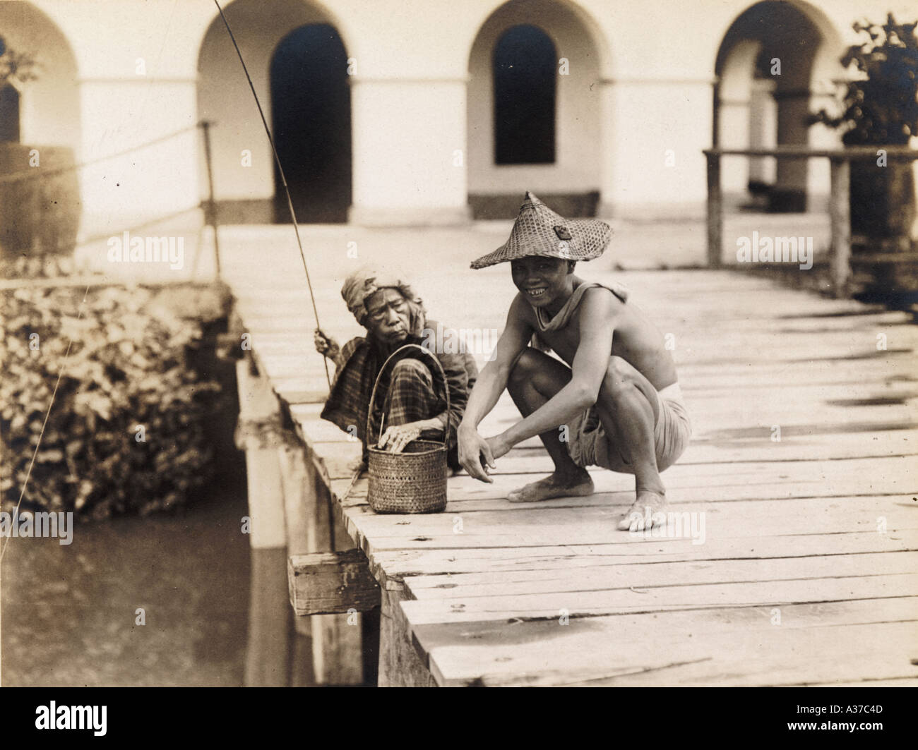 Kuching Malay Fisherwoman and Rickshaw Coolie Stock Photo