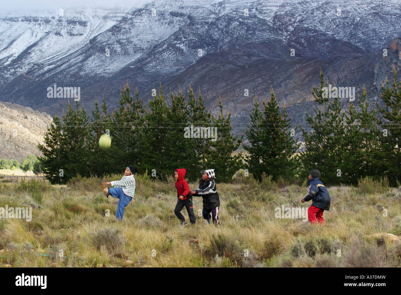 Children play soccer with the Matroosberg Mountain reserve, Ceres, South Africa. Stock Photo